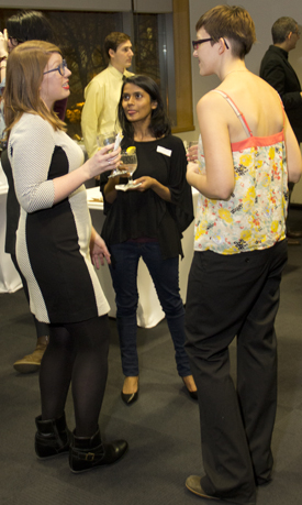 Anna Roberts, left, talks to fellow Elia Scholars Syeda Mariam Humayun centre and Melanie Wilmink, right at a reception celebrating the Elia Scholars