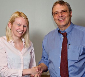 photo of student Lesley Deas being congratulated by professor Laurence Harris