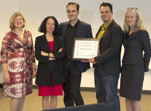 photo of FGS Associate Dean Karen Krasny, left, Philosophy Graduate Program Director Claudine Verheggen, Professor Henry Jackman, Dr. Marc Champagne and Dean Barbara Crow with Dr. Champagne's Dissertation Prize