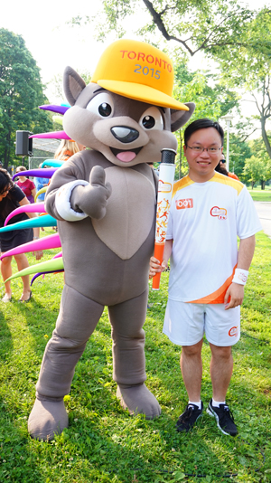 York PhD student Chris Chen with Pachi the Pan Am Games mascot