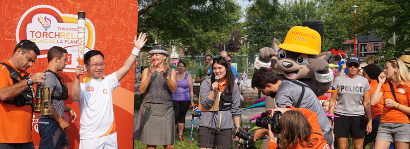 York PhD student Chris Chen with the Pan Am torch during the relay