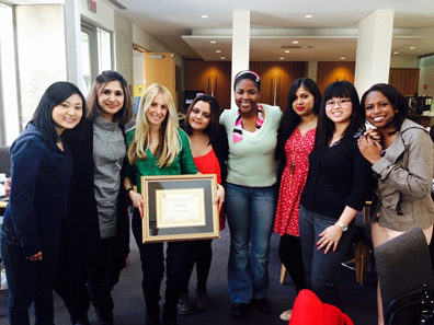 photo of Vivian after receiving the 2013 John O’Neil Award for Teaching Excellence from members of the Sociology Undergraduate Student’s Association (S.U.S.A)