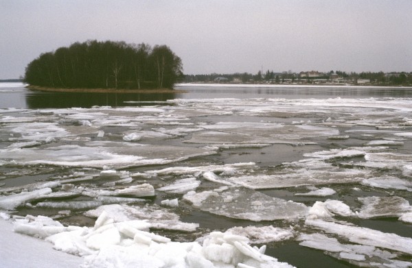photo of river with melting ice