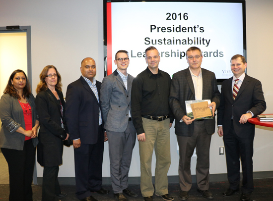 photo of the finance department staff accepting their award