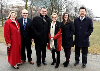 group photo of Minister Helena Jaczek, Minister Steven Del Duca, York PhD student Jesse Thistle, Premier Kathleen Wynne, York PhD student Dessi Zaharieva and MPP Han Dong