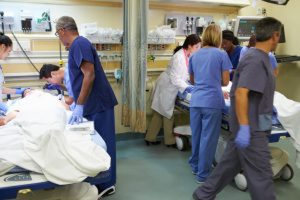 photo of health care workers in an emergency room