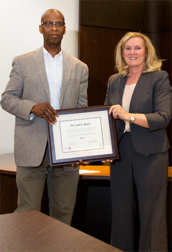 photo of professor Carl James and vice-president academic and provost Rhonda Lenton