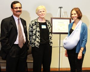 photo of FGS Dean Fahim Quadir, left, Prof. Pat Armstrong and nominator Rachel Barken (with son Francis)
