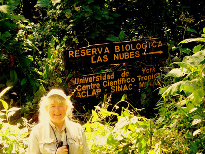 photo of Adrienne Perry preparing to head on to the trail that leads to Las Nubes
