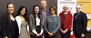photo of Winners of the York U 3MT are Victoria Larocca (second place), Annalise D’Souza (first place), Mikhaela Gray (third place) with judges Steve Watt, Shamshad Madhok, Alice Pitt, Matthew Shulman