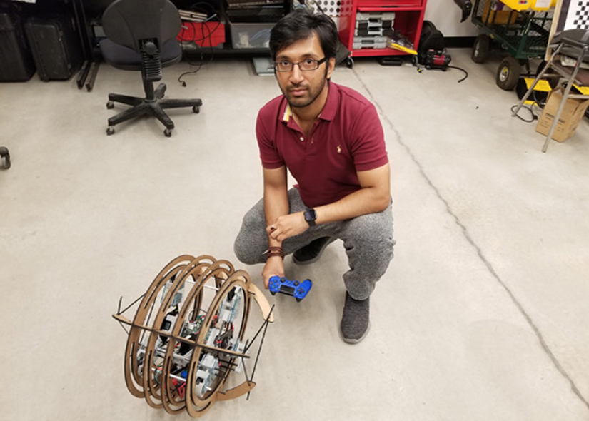 photo of Bir Bikram Day with his spherical robot