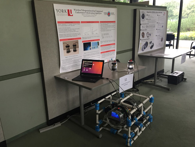 photo of the students’ posters at the conference and Robert Codd–Downey’s LightByte technology