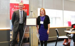 photo of Dean Tom Loebel and Laura Levin