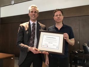 photo of Dean Thomas Loebel and Professor Richard Murray with the teaching award