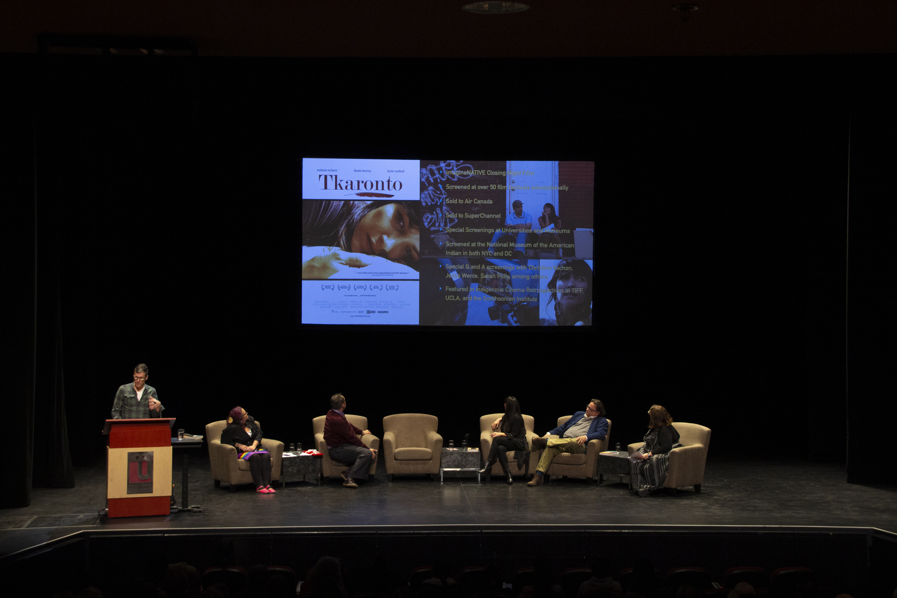 photo of the Kitty Lundy Lecture panelists and moderators on stage